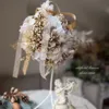 シャンパンゴールドポインセチアの花手毬 画像1