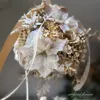 シャンパンゴールドポインセチアの花手毬 画像4