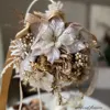 シャンパンゴールドポインセチアの花手毬 画像6