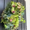 グリーン胡蝶蘭とグロリオサのハーフムーンリース 画像5